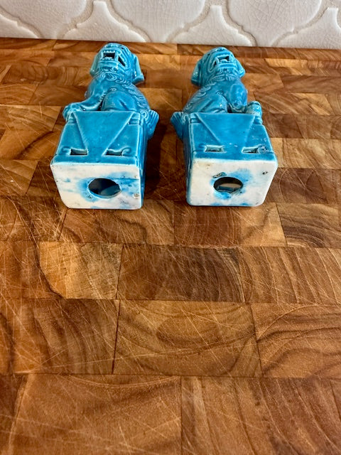 Pair of vintage Chinese glazed ceramic Foo Dog figurines.