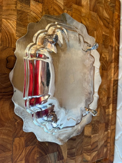 Gorham silver plated oval serving tray with decorative rim and feet.
