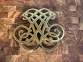 Vintage solid brass trivet.