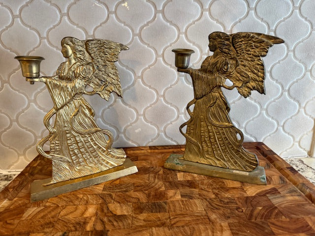 Set of two vintage angel candle holders.  Solid Brass.