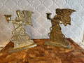 Set of two vintage angel candle holders.  Solid Brass.