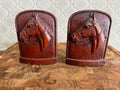 Pair of vintage Syroco Ware resin bookends.