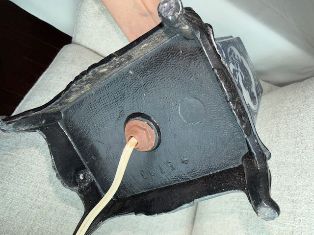 Vintage Chinese blue and white porcelain table lamp featuring a foo dog design.