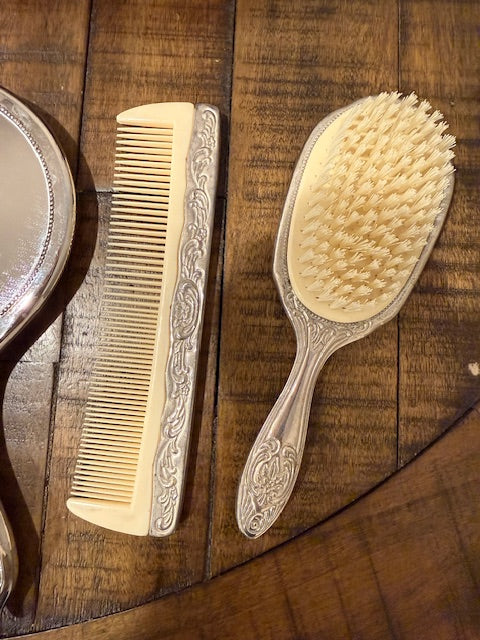 Ornate Vanity Set with Comb, Brush, and Mirror.