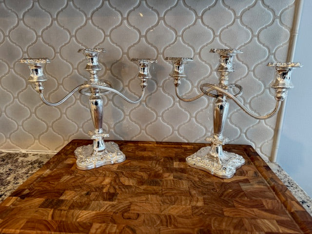 Pair of vintage silver plated candelabras.