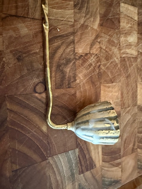 Solid Brass candle snuffer.