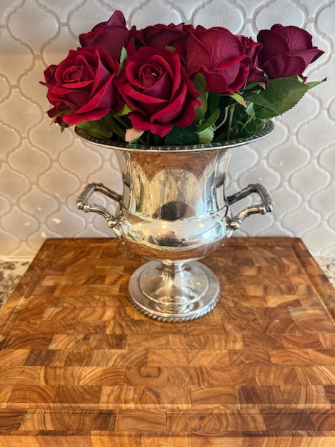 Silver plated champagne chiller or ice bucket.