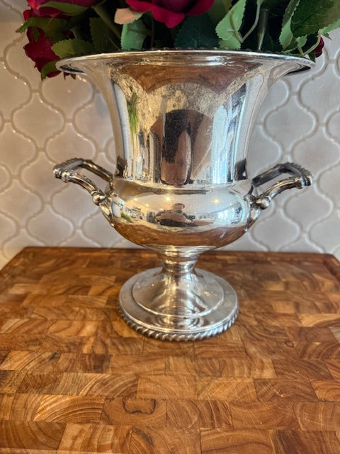 Silver plated champagne chiller or ice bucket.