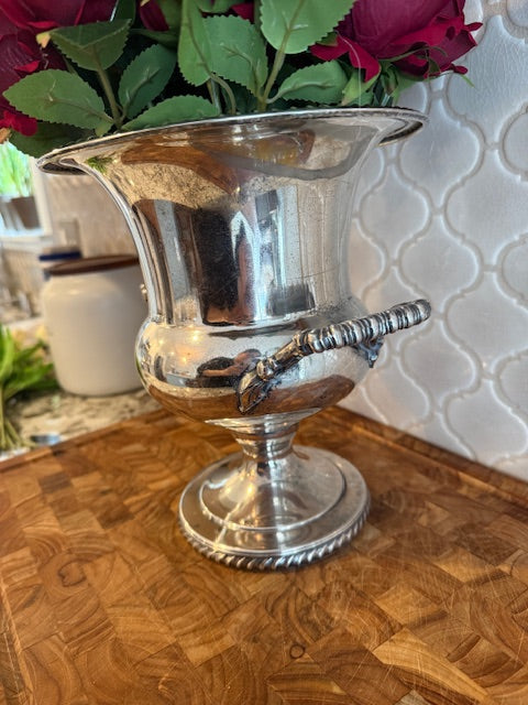 Silver plated champagne chiller or ice bucket.