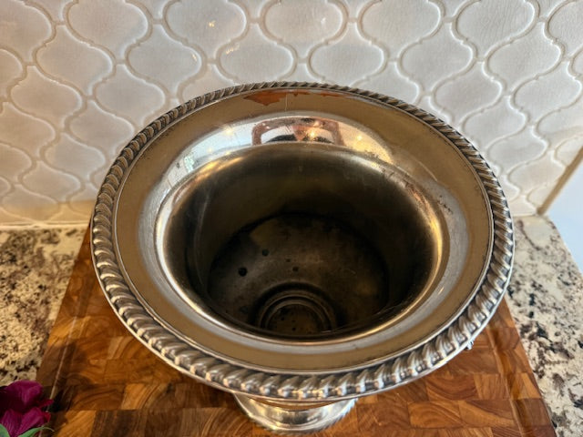 Silver plated champagne chiller or ice bucket.