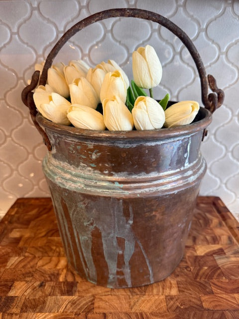 Large copper pot with handle.