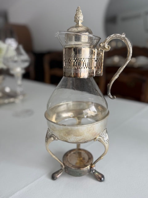 Vintage silver plated glass carafe set.
