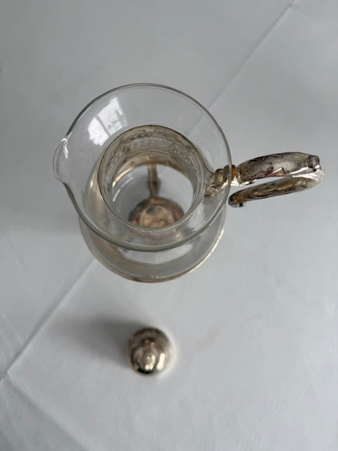 Vintage silver plated glass carafe set.
