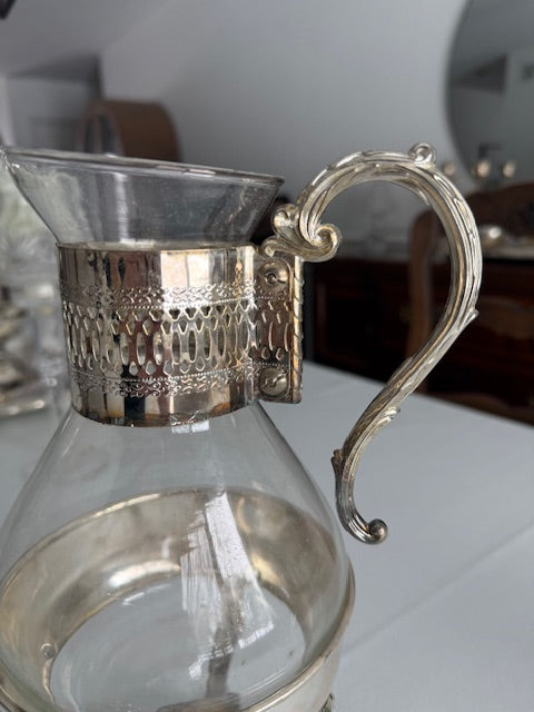 Vintage silver plated glass carafe set.