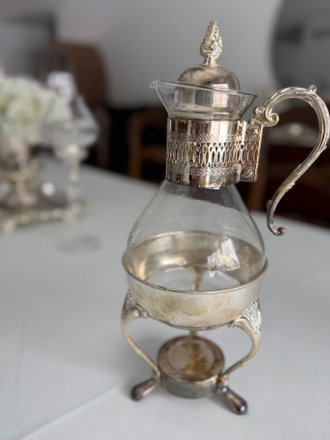 Vintage silver plated glass carafe set.