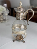 Vintage silver plated glass carafe set.
