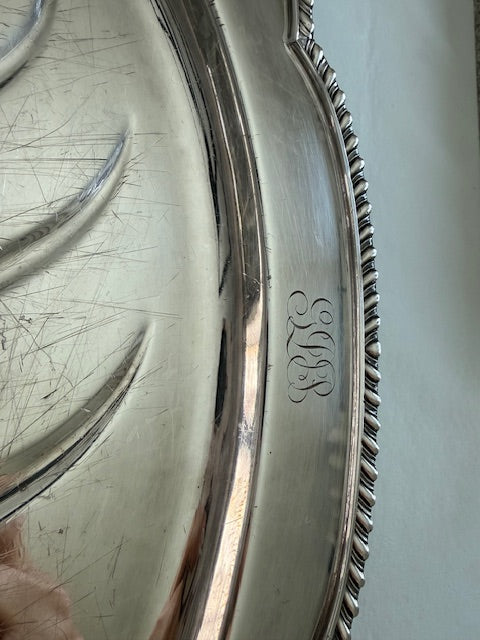 Wallace, vintage engraved silver plated footed oval meat serving platter with well and tree design.