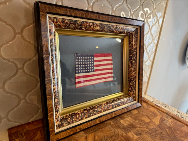 Framed  antique 48 star American Flag picture.