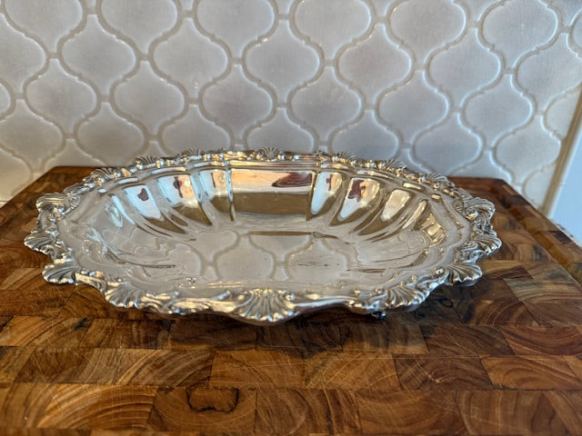 Gorham silver plated oval serving tray with decorative rim and feet.
