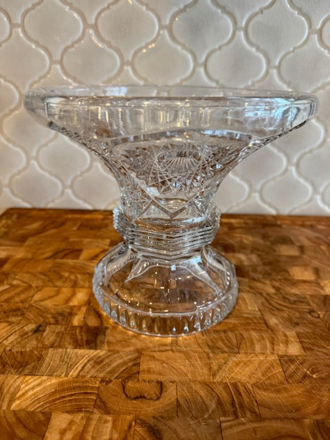Early American pressed glass punch bowl on a pedestal stand.