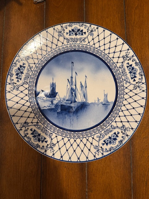 2 12 inch Dutch Delft style plates.
