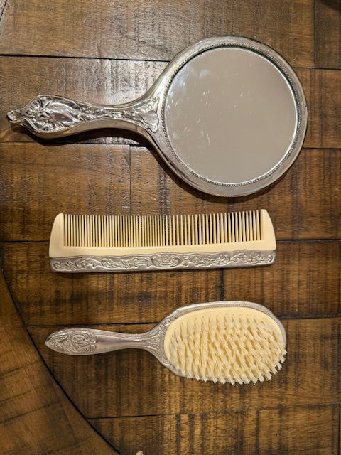 Ornate Vanity Set with Comb, Brush, and Mirror.