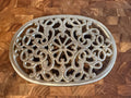 Vintage trivet with hanger.